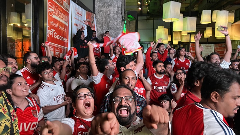 Arsenal Pune SC fans roaring during a live screening